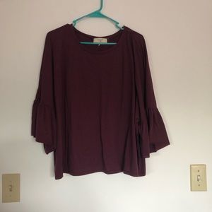 Semi-cropped peplum top
